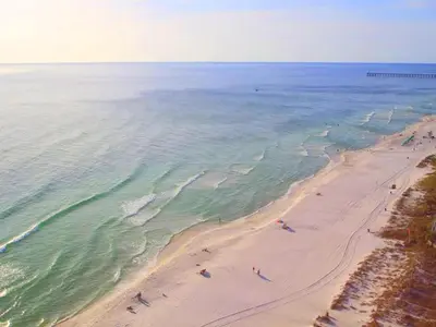 an aerial view of a beach with people on it at Majestic Beach Towers 1-1706 in Panama City Beach