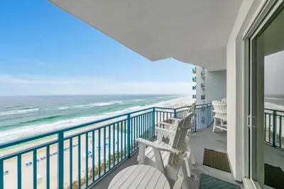 a balcony with a view of the ocean at Sterling Breeze 802 in Panama City Beach