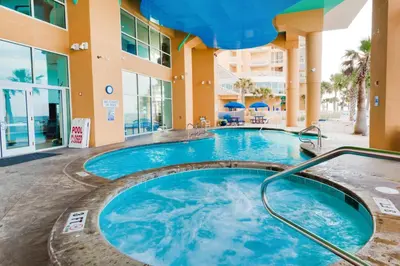 a hot tub in the middle of a building at Splash 1802E in Panama City Beach