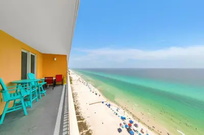 a view of the beach from a balcony at Splash 1802E in Panama City Beach