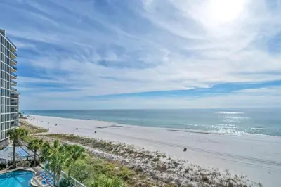 a view of a beach with people walking on it at Edgewater Tower 3-412 in Panama City Beach