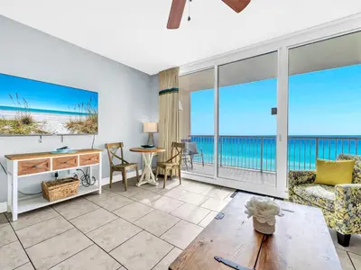 a living room with a view of the ocean at Majestic Beach Towers 1-2314 in Panama City Beach