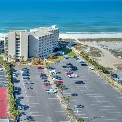 an aerial view of a parking lot next to the ocean at Top of the Gulf 713 in Panama City Beach