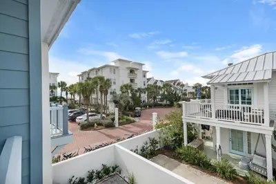 a view of a street from a balcony of condos at Sunset Serenade in Rosemary Beach