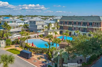 an aerial view of a apartment complex with a swimming pool at Village of South Walton B375 in Seacrest