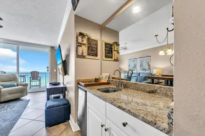a kitchen with a sink and a view of the ocean at Majestic Beach Towers 2-1005 in Panama City Beach