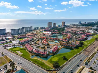 an aerial view of a resort near the ocean at Latitude Adjustment by Book That Condo in Panama City Beach