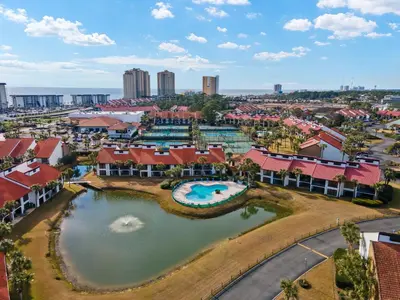 an aerial view of a resort with a pool at Latitude Adjustment by Book That Condo in Panama City Beach