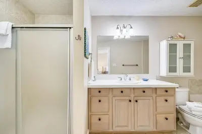 a bathroom with a sink and a shower at Beaches and Dreams by Book That Condo in Panama City Beach