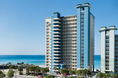 a view of two tall buildings next to the ocean at Grandview East 404 in Panama City Beach