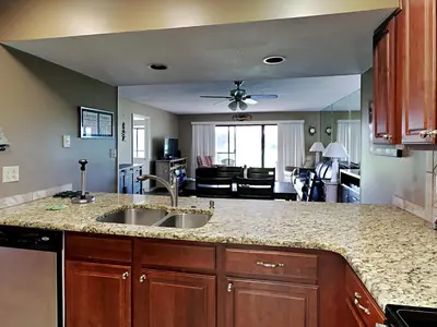 a kitchen with a sink and a counter top at Edgewater Villa #2605 in Panama City Beach