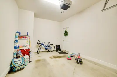 an empty room with a bike in the corner at Beautiful PCB Getaway Less Than 3 Mi to the Beach! in Panama City Beach