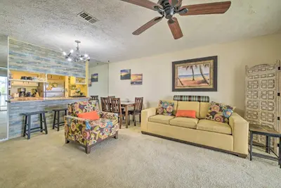 a living room with a couch and chairs and a bar at 2 Mi to Beach! Bayside PCB Escape with Pool Access in Panama City Beach