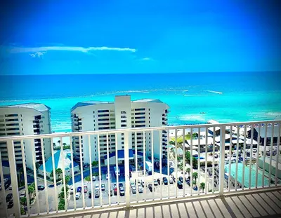 a view of the ocean from a balcony of a resort at 1717 Laketown Wharf 1 King Bedroom, 2 Bath in Panama City Beach