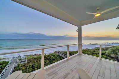 a view of the ocean from the balcony of a house at Beach Love in Santa Rosa Beach
