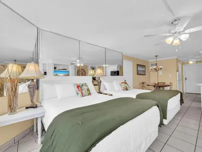 two beds in a hotel room with at Top of the Gulf 610 in Panama City Beach