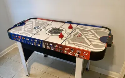 a play table with a game on it at PALM COVE VACATION HOME- One level, Community pool, Pet Friendly in Panama City Beach