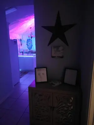 a room with a black star on the wall at PALM COVE VACATION HOME- One level, Community pool, Pet Friendly in Panama City Beach