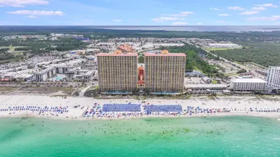 an aerial view of a resort and the beach at Calypso Beach Resort & Towers by Panhandle Getaways in Panama City Beach