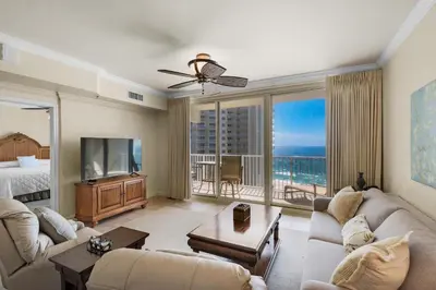 a living room with a view of the ocean at Shores of Panama 1313 in Panama City Beach
