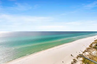 an aerial view of a beach with people on it at Majestic Beach Towers 1-1911 in Panama City Beach
