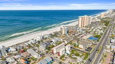 an aerial view of a beach and the ocean at Beach House - Gulf Dream by Panhandle Getaways in Panama City Beach