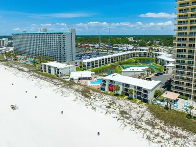 an aerial view of a resort with a beach and buildings at Sugar Beach 19C in Panama City Beach