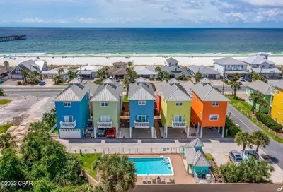 an aerial view of a row of houses and the beach at Summer Towne by Panhandle Getaways in Panama City Beach