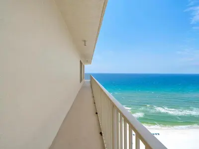 a balcony with a view of the ocean at Gulf Crest 2107A in Panama City Beach