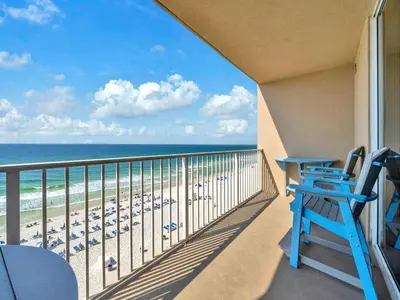 a balcony with a view of the beach at Tidewater 607 in Panama City Beach