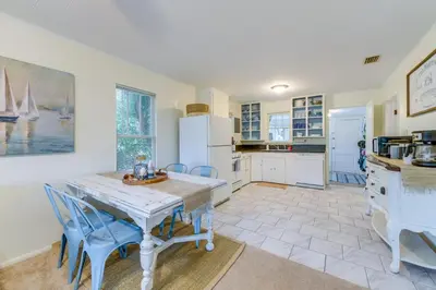 a kitchen with a table and chairs in a kitchen at Panama City Home with Beach Gear and 2 Bikes in Panama City