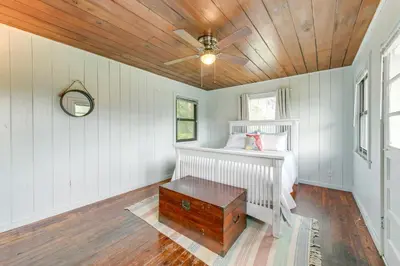 a bedroom with a bed with a wooden ceiling at Panama City Home with Beach Gear and 2 Bikes in Panama City