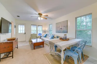a living room with a table and a couch at Panama City Home with Beach Gear and 2 Bikes in Panama City