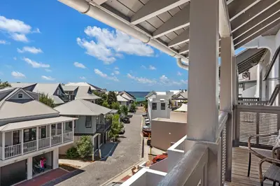 a view from the balcony of a house at The Savannah Unit 2E in Rosemary Beach