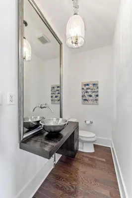 a bathroom with a sink and a mirror at The Savannah Unit 2E in Rosemary Beach