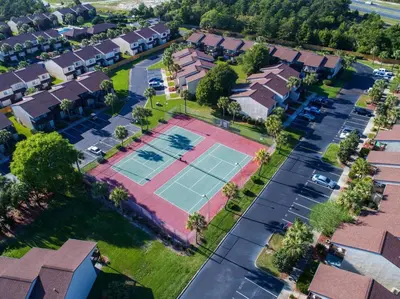an overhead view of a tennis court in a suburb at Portside Resort Pet Friendly Rentals by Panhandle Getaways in Panama City Beach