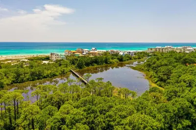 an aerial view of a river and the ocean at Prominence North #94A - Happy Ours in Watersound Beach