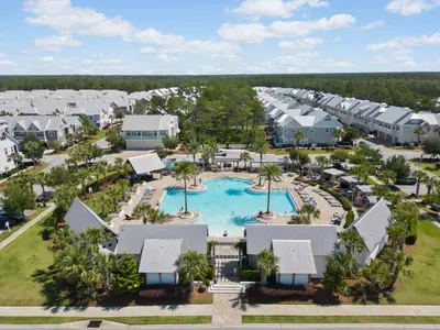 an aerial view of a resort with a pool at Prominence North #94A - Happy Ours in Watersound Beach