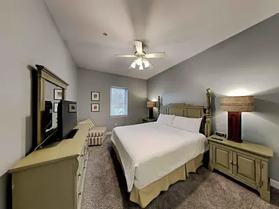 a bedroom with a bed and a ceiling fan at Seagrove Highlands #2104 in Santa Rosa Beach