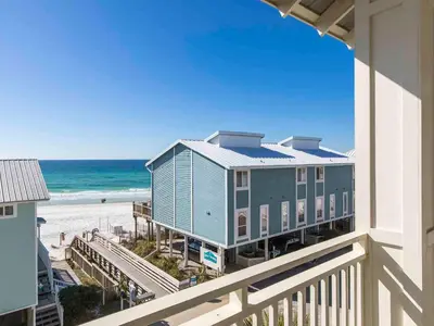 a view of the beach from the balcony of a condo at All Decked Out 30A in Seagrove Beach