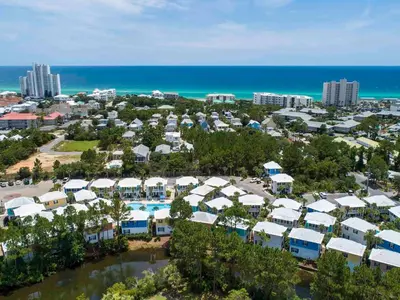 an aerial view of a resort near the ocean at Bungalows at Seagrove #138 in Seagrove Beach