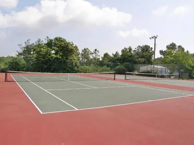 a tennis court with a net on top of it at Beachside Villas #413 in Seagrove Beach