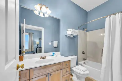 a bathroom with a sink and a toilet and a shower at Village of South Walton B377-G in Rosemary Beach