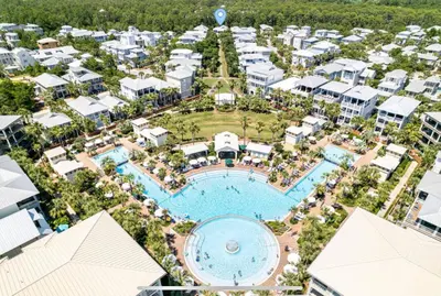 an aerial view of a resort with a pool at The Crown Jewel of Seacrest Beach in Inlet Beach