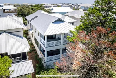 an aerial view of a house with white roofs at The Crown Jewel of Seacrest Beach in Inlet Beach