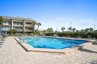 a swimming pool in front of a hotel at 30A Emerald Hill Beach Resort by Panhandle Getaways in Santa Rosa Beach