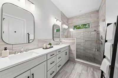 a white bathroom with a sink and a shower at 30A Beach House - Casa Brisa in Inlet Beach