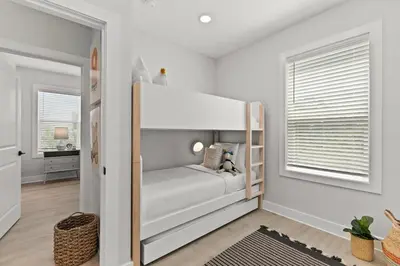 a childs bedroom with a bunk bed and a window at 30A Beach House - Casa Brisa in Inlet Beach