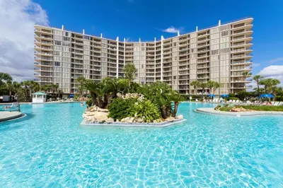 a resort with a pool in front of a building at Edgewater Tower 3-1012 in Panama City Beach
