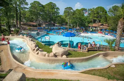 a water park with people in a water slide at Edgewater Tower 3-1012 in Panama City Beach